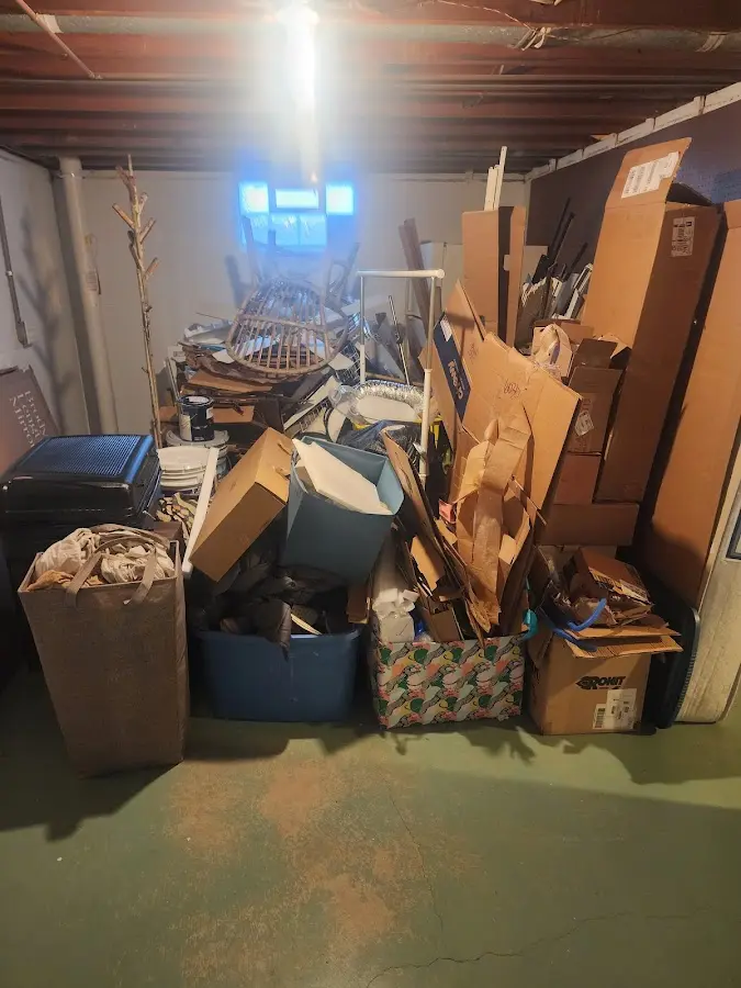 Roll-off dumpster container at job site for 15 Yard Dumpster Rental in Cameron